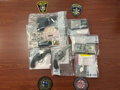 Two city residents charged after Thursday morning raid on Falconer Street